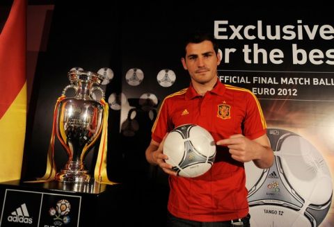 MADRID, SPAIN - MAY 09:  Spanish captain Iker Casillas unveils the official adidas Tango 12 Finale ball, the official match ball for the UEFA Euro 2012 final, at Ciudad de Futbol on May 9, 2012 in Madrid, Spain.  (Photo by Getty Images for adidas) 