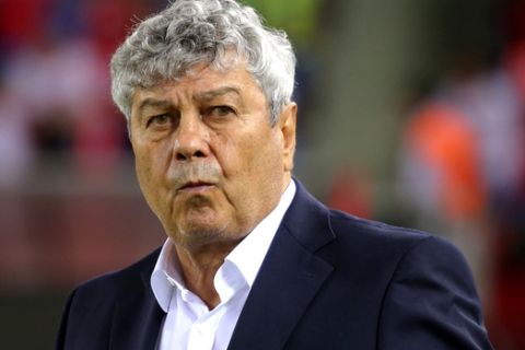 Turkey's head coach Mircea Lucescu stand prior to the UEFA Nations League soccer match between Turkey and Russia in Trabzon, Turkey, Friday, Sept. 7, 2018. (AP Photo)