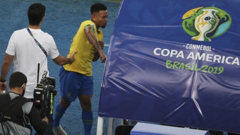 Brazil's Gabriel Jesus punches the bench after referee Roberto Tobar showed him the red card during the final soccer match of the Copa America against Peru at the Maracana stadium in Rio de Janeiro, Brazil, Sunday, July 7, 2019. (AP Photo/Natacha Pisarenko)