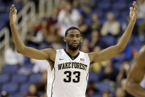 Wake Forest's Aaron Rountree III (33) reacts after making a basket against Virginia Tech during the second half of an NCAA college basketball game in the first round of the Atlantic Coast Conference tournament in Greensboro, N.C., Tuesday, March 10, 2015. (AP Photo/Gerry Broome)