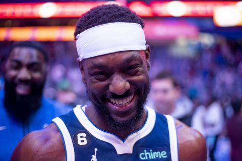 Dallas Mavericks guard Kemba Walker (34) smiles in the second half of an NBA basketball game in Dallas, Friday, Dec. 16, 2022. Dallas won the game by a final of 130-110.(AP Photo/Emil Lippe)