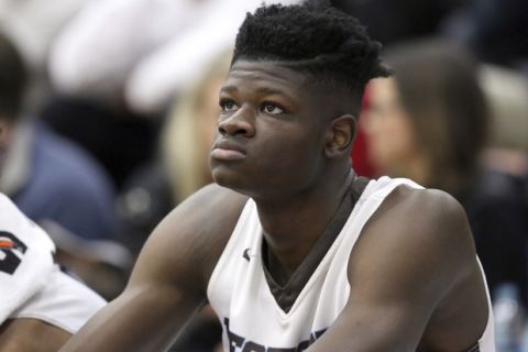 FILE - In this Jan. 14, 2017, file photo, Westtown School's Mo Bamba watches from the bench during a high school basketball game against Hillcrest Prep at the 2017 Hoophall Classic in Springfield, Mass. The older brother of Texas basketball recruit Mo Bamba, one of the top incoming players in the country next season, says Bamba took improper gifts and money from a Detroit financial adviser that would make him ineligible to play in college. Texas says Bambas amateur status had previously been reviewed by the NCAA and hes been cleared to play (AP Photo/Gregory Payan, File)