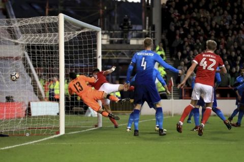 Nottingham Forest's Eric Lichaj scores his side's first goal of the game during the English FA Cup, Third Round soccer match between Nottingham Forest and Arsenal at the City Ground, Nottingham, England, Sunday, Jan. 7, 2018. (Mike Egerton/PA via AP)