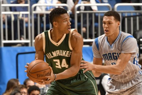 ORLANDO, FL - NOVEMBER 27: Giannis Antetokounmpo #34 of the Milwaukee Bucks handles the ball against the Orlando Magic on November 27, 2016 at Amway Center in Orlando, Florida. NOTE TO USER: User expressly acknowledges and agrees that, by downloading and or using this photograph, User is consenting to the terms and conditions of the Getty Images License Agreement. Mandatory Copyright Notice: Copyright 2016 NBAE (Photo by Fernando Medina/NBAE via Getty Images)