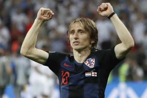 Croatia's Luka Modric celebrates after his team advanced to the final during the semifinal match between Croatia and England at the 2018 soccer World Cup in the Luzhniki Stadium in Moscow, Russia, Wednesday, July 11, 2018. (AP Photo/Alastair Grant)