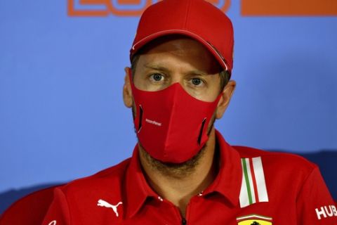 Ferrari driver Sebastian Vettel of Germany speaks during drivers news conference the at the Red Bull Ring racetrack in Spielberg in Spielberg, Austria, Thursday, July 2, 2020. Austrian Formula One Grand Prix will be held on Sunday. (Mark Sutton/Pool via AP)