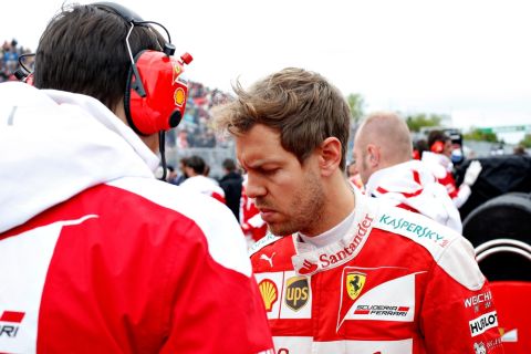 MONTREAL, QC - JUNE 12:  Sebastian Vettel of Germany and Ferrari on the grid before the the Canadian Formula One Grand Prix at Circuit Gilles Villeneuve on June 12, 2016 in Montreal, Canada.  (Photo by Charles Coates/Getty Images)