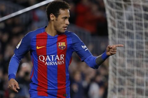 Barcelona's Neymar celebrates after scoring his side's second goal against Celta during a Spanish La Liga soccer match between Barcelona and Celta at the Camp Nou stadium in Barcelona, Saturday, March 4, 2017. Neymar scored once in Barcelona's 5-0 victory. (AP Photo/Francisco Seco)