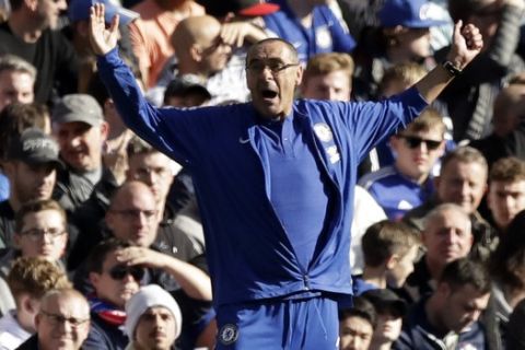 Chelsea's manager Maurizio Sarri gestures during their English Premier League soccer match between Chelsea and Manchester United at Stamford Bridge stadium in London Saturday, Oct. 20, 2018. (AP Photo/Matt Dunham)
