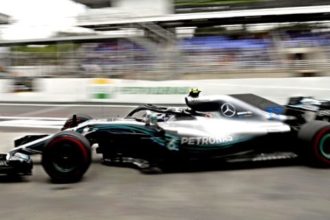 Mercedes Valtteri Bottas, of Finland, departs the pit during the first free practice at the Interlagos race track in Sao Paulo, Brazil, Friday, Nov. 9, 2018. Brazil will stage the Formula One Grand Prix's penultimate race of the season on Sunday. (AP Photo/Andre Penner)