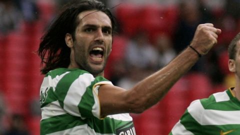 Celtic's Georgios Samaras, left, reacts after scoring a goal with fellow team member Chris Killen, right, during their Wembley Cup soccer match against Tottenham at Wembley Stadium, London, Sunday, July 26, 2009. (AP Photo/Sang Tan)