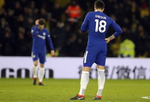 Chelsea's Olivier Giroud looks dejected after their team lost the English Premier League soccer match between Watford and Chelsea at Vicarage Road stadium in London, Monday, Feb. 5, 2018.(AP Photo/Frank Augstein)