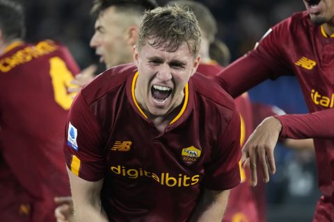 Roma's Ola Solbakken celebrates after scoring his side's opening goal during a Serie A soccer match between Roma and Hellas Verona, at Rome's Olympic Stadium, Sunday, Feb. 19, 2023. (AP Photo/Andrew Medichini)