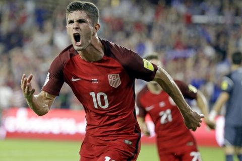 United States' Christian Pulisic (10) celebrates after scoring a goal against Panama during the first half of a World Cup qualifying soccer match, Friday, Oct. 6, 2017, in Orlando, Fla. (AP Photo/John Raoux)