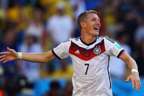 RIO DE JANEIRO, BRAZIL - JULY 04: Bastian Schweinsteiger of Germany celebrates after the 2014 FIFA World Cup Brazil Quarter Final match between France and Germany at Maracana on July 4, 2014 in Rio de Janeiro, Brazil.  (Photo by Amin Mohammad Jamali/Getty Images)