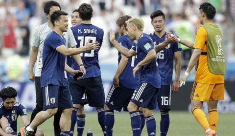 Japanese players after during the group H match between Japan and Poland at the 2018 soccer World Cup at the Volgograd Arena in Volgograd, Russia, Thursday, June 28, 2018. Poland won 1-0. (AP Photo/Andrew Medichini)