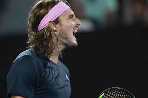 Greece's Stefanos Tsitsipas reacts during his semifinal against Spain's Rafael Nadal at the Australian Open tennis championships in Melbourne, Australia, Thursday, Jan. 24, 2019. (AP Photo/Andy Brownbill)