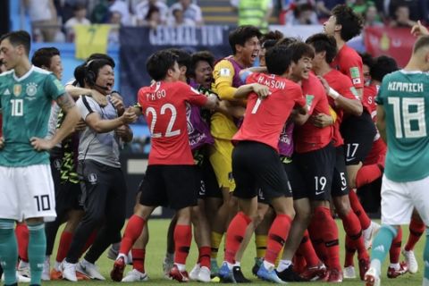 South Korea's players celebrate a goal during the group F match between South Korea and Germany, at the 2018 soccer World Cup in the Kazan Arena in Kazan, Russia, Wednesday, June 27, 2018. (AP Photo/Lee Jin-man)