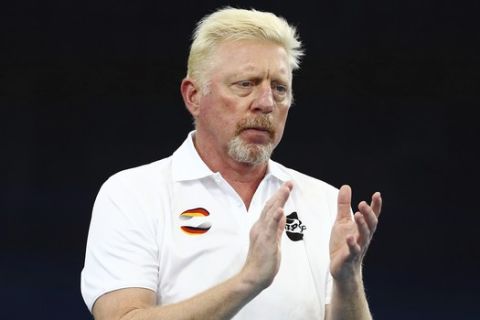 German team captain Boris Becker watches the match between Jan-Lennard Struff of Germany and Felix Auger-Aliassime of Canada at the ATP Cup tennis tournament in Brisbane, Australia, Tuesday, Jan. 7, 2020. (AP Photo/Tertius Pickard)
