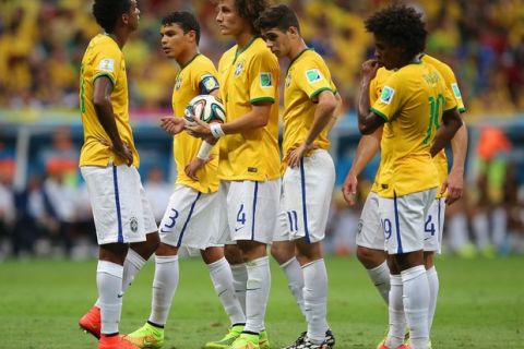 BRASILIA, BRAZIL - JULY 12: (L-R) Jo, Thiago Silva, David Luiz, Oscar, Maxwell and Willian look on during the 2014 FIFA World Cup Brazil Third Place Playoff match between Brazil and the Netherlands at Estadio Nacional on July 12, 2014 in Brasilia, Brazil.  (Photo by Dean Mouhtaropoulos/Getty Images)