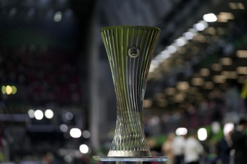 The Europa Conference League trophy is displayed on the pitch before the Europa Conference League final soccer match between AS Roma and Feyenoord at National Arena in Tirana, Albania, Wednesday, May 25, 2022. (AP Photo/Thanassis Stavrakis)