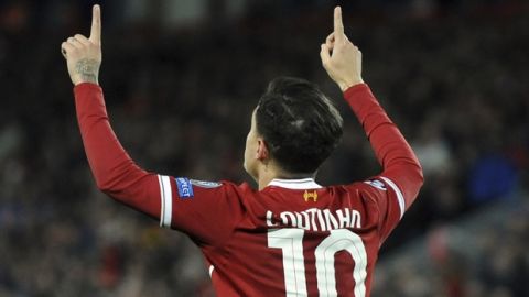 Liverpool's Philippe Coutinho celebrates after scoring his side's fifth goal during the Champions League Group E soccer match between Liverpool and Spartak Moscow at Anfield, Liverpool, England, Wednesday, Dec. 6, 2017. (AP Photo/Rui Vieira)