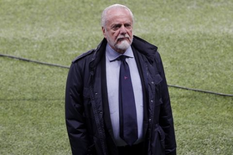 Napoli soccer club president Aurelio De Laurentis stands on the pitch during a training session, at the Parc des Princes stadium in Paris, Tuesday, Oct. 23, 2018. PSG will play against Napoli in a Champions League group C Champions League soccer match on Wednesday. (AP Photo/Thibault Camus)