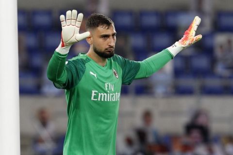 AC Milan's goalkeeper Gianluigi Donnarumma gestures during the Serie A soccer match between Lazio and AC Milan at the Rome Olympic stadium, Saturday, July 4, 2020. (AP Photo/Riccardo De Luca)