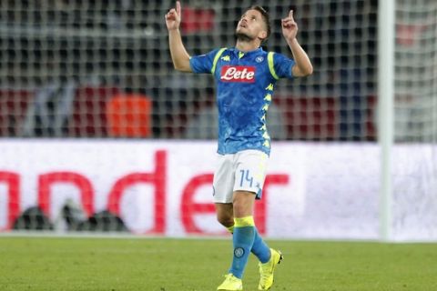 Napoli's Dries Mertens celebrates after scoring his side's second goal during the Champions League, group C, soccer match between Paris Saint Germain and Napoli at the Parc des Princes stadium in Paris, Wednesday, Oct. 24, 2018. (AP Photo/Francois Mori)