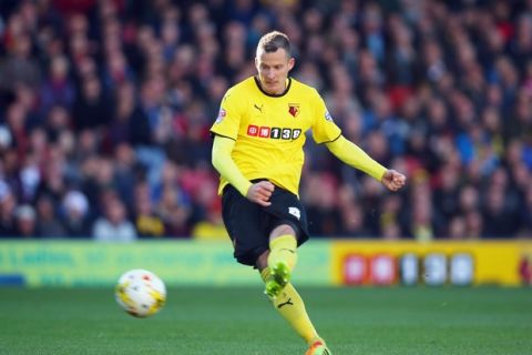 WATFORD, ENGLAND - OCTOBER 04:  Daniel Tozser of Watford scores during the Sky Bet Championship match between Watford and Brighton & Hove Albion at Vicarage Road on October 4, 2014 in Watford, England.  (Photo by Bryn Lennon/Getty Images)