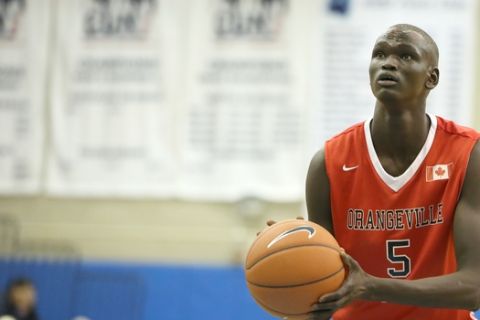 Orangeville Prep's Matur Maker #5 shoots a free throw against Phelps Academy during their Big Apple Basketball Classic high school basketball game in Manhattan, NY on Saturday, January 17,  2015.  (AP Photo/Gregory Payan)