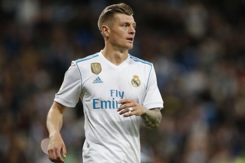Real Madrid's Toni Kroos reacts after scoring his side's sixth goal during a Spanish La Liga soccer match between Real Madrid and Celta at the Santiago Bernabeu stadium in Madrid, Spain, Saturday, May 12, 2018. (AP Photo/Paul White)