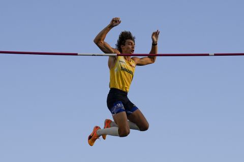 Armand Duplantis, of Sweden, celebrates after setting a world record in the men's pole vault final at the World Athletics Championships on Sunday, July 24, 2022, in Eugene, Ore. (AP Photo/Charlie Riedel)