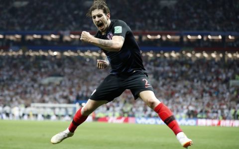 Croatia's Sime Vrsaljko celebrates after his team advanced to the final during the semifinal match between Croatia and England at the 2018 soccer World Cup in the Luzhniki Stadium in Moscow, Russia, Wednesday, July 11, 2018. (AP Photo/Frank Augstein)