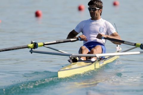 VASILEIOS POLYMEROS (GREECE) COMPETES AT MEN'S LIGHTWEIGHT SINGE SCULLS HEAT DURING DAY 1 FISA ROWING WORLD CUP ON ESTANY LAKE IN BANYOLES, SPAIN...BANYOLES , SPAIN , MAY 29, 2009..( PHOTO BY ADAM NURKIEWICZ / MEDIASPORT )..PICTURE ALSO AVAIBLE IN RAW OR TIFF FORMAT ON SPECIAL REQUEST.