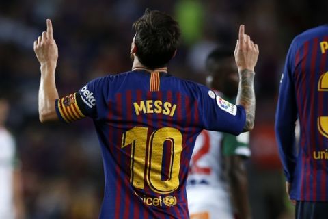 FC Barcelona's Lionel Messi celebrates after scoring against Alaves during a Spanish La Liga soccer match at Camp Nou stadium in Barcelona, Spain, Saturday, Aug. 18, 2018. (AP Photo/Manu Fernandez)