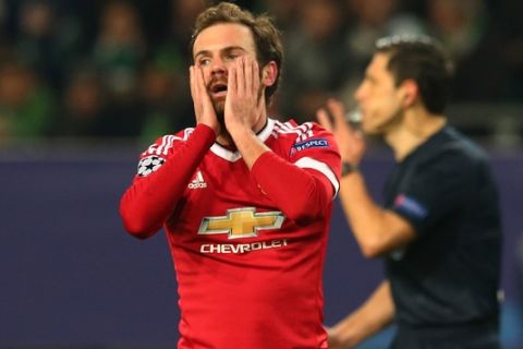 WOLFSBURG, GERMANY - DECEMBER 08:  Juan Mata of Manchester United reacts after a missed chance on goal during the UEFA Champions League group B match between VfL Wolfsburg and Manchester United at the Volkswagen Arena on December 8, 2015 in Wolfsburg, Germany.  (Photo by Martin Rose/Bongarts/Getty Images)