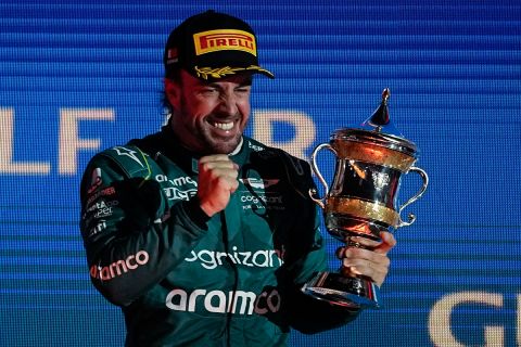 Aston Martin driver Fernando Alonso of Spain celebrates after he took third place at the Formula One Bahrain Grand Prix at Sakhir circuit, Sunday, March 5, 2023. (AP Photo/Ariel Schalit)