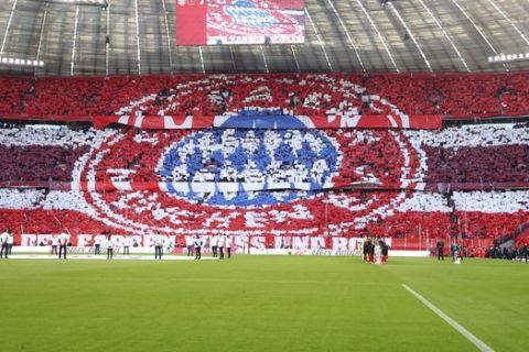 Fans fill the stands before the German Bundesliga soccer match between FC Bayern Munich and FC Augsburg in Munich, Germany, Sunday, March 8, 2020. (AP Photo/Matthias Schrader)