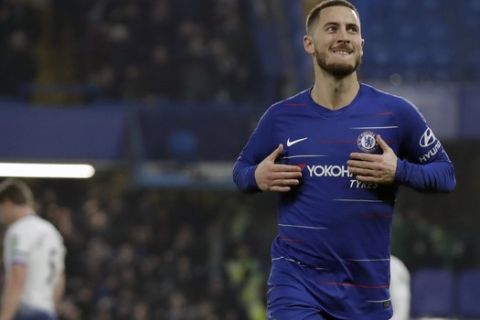 Chelsea's Eden Hazard celebrates after scoring his side's second goal during the second leg of the English League Cup semifinal soccer match between Chelsea and Tottenham Hotspur at Stamford Bridge stadium in London, Thursday, Jan. 24, 2019. (AP Photo/Matt Dunham)