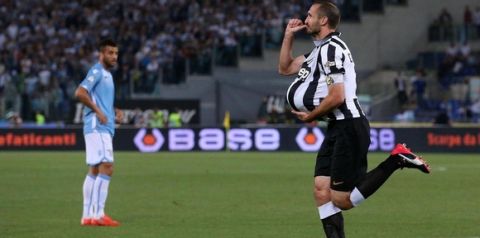 Juventus' Giorgio Chiellini (R) jubilates after scoring the goal during the Italy Cup final soccer match Juventus FC vs SS Lazio at Olimpico stadium in Rome, Italy, 20 May 2015.
ANSA/ALESSANDRO DI MEO