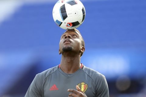 Belgium's Divock Origi controls the ball as he attends a training session at the Grand Stade in Decines-Charpieu, near Lyon, France, Sunday, June 12, 2016. Belgium will face Italy in a Euro 2016 Group E soccer match in Lyon on Monday, June 13, 2016. (AP Photo/Antonio Calanni)