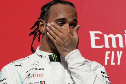Mercedes driver Lewis Hamilton, of Britain, reacts following the Formula One U.S. Grand Prix auto race at the Circuit of the Americas, Sunday, Nov. 3, 2019, in Austin, Texas. (AP Photo/Chuck Burton)