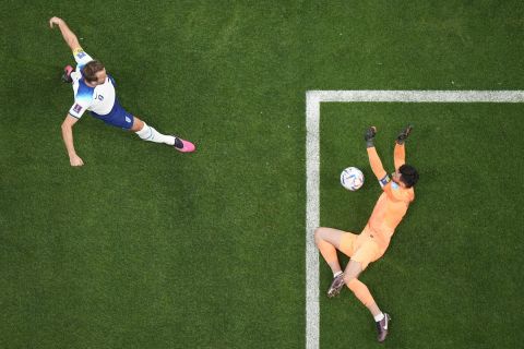 France's goalkeeper Hugo Lloris saves before England's Harry Kane can score during the World Cup quarterfinal soccer match between England and France, at the Al Bayt Stadium in Al Khor, Qatar, Saturday, Dec. 10, 2022. (AP Photo/Pavel Golovkin)