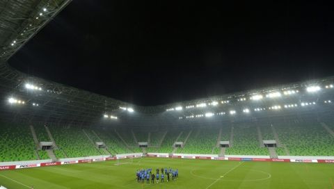 Players of Finland's national soccer team are seen during their training in the Groupama Arena in Budapest, Hungary, Thursday, Nov. 13, 2014, on the eve of their game against Hungary in the Euro 2016 qualifying Group F soccer match to be played in the Hungarian capital. (AP Photo/Tibor Illyes, MTI)