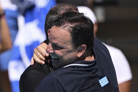 Greece head coach Theodoros Vlachos celebrates their victory in the Men's water polo bronze medal match between Greece and Croatia at the 19th FINA World Championships in Budapest, Hungary, Sunday, July 3, 2022. (AP Photo/Anna Szilagyi)
