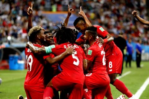Panama players celebrate after an own goal by Tunisia's Yassine Meriah during the group G match between Panama and Tunisia at the 2018 soccer World Cup at the Mordovia Arena in Saransk, Russia, Thursday, June 28, 2018. (AP Photo/Darko Bandic)