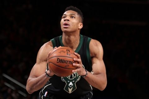 NEW YORK, NY - JANUARY 4: Giannis Antetokounmpo #34 of the Milwaukee Bucks shoots a free throw against the New York Knicks on January 4, 2017 at Madison Square Garden in New York, NY. NOTE TO USER: User expressly acknowledges and agrees that, by downloading and or using this photograph, User is consenting to the terms and conditions of the Getty Images License Agreement. Mandatory Copyright Notice: Copyright 2017 NBAE  (Photo by Nathaniel S. Butler/NBAE via Getty Images)