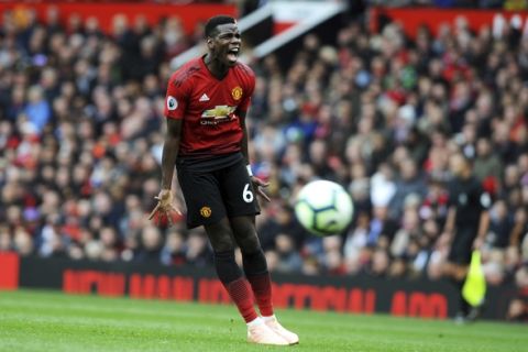 Manchester United's Paul Pogba reacts during the English Premier League soccer match between Manchester United and Wolverhampton Wanderers at Old Trafford stadium in Manchester, England, Saturday, Sept. 22, 2018. (AP Photo/Rui Vieira)