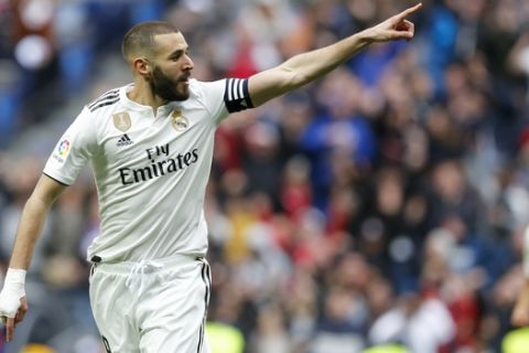 Real Madrid's Karim Benzema reacts after the goal he scored was disallowed during a Spanish La Liga soccer match between Real Madrid and Eibar at the Santiago Bernabeu stadium in Madrid, Spain, Saturday April 6, 2019. (AP Photo/Paul White)